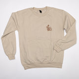Beige sweatshirt with a small logo on a white background