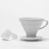 White ceramic coffee filter on a white background