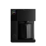 Black coffee machine on a white background. fellow aiden coffee machine. warranty through fellow, no returns on equipment.